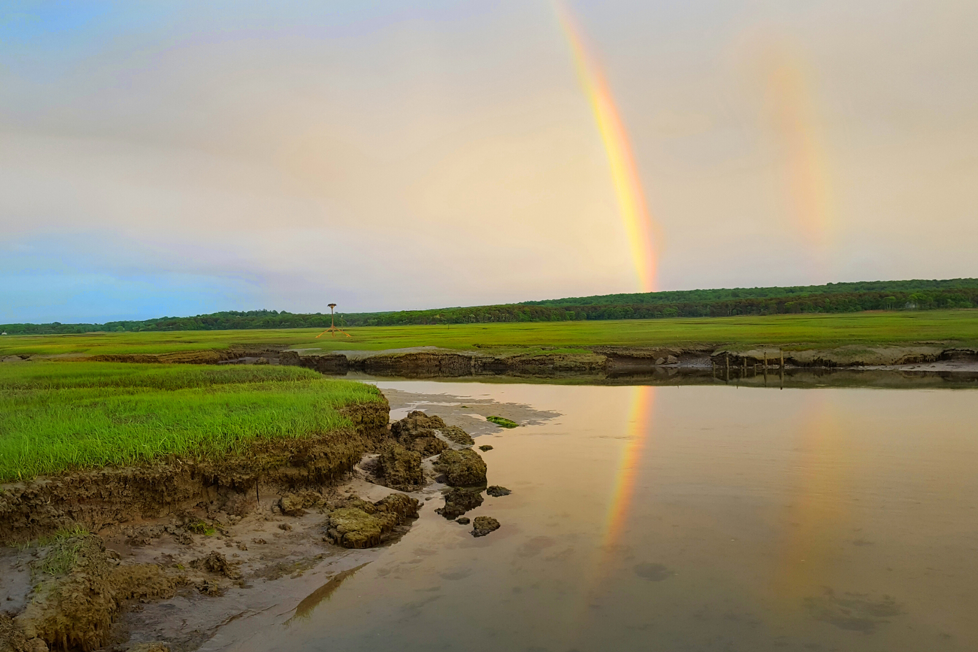 Two rainbows over a landscape