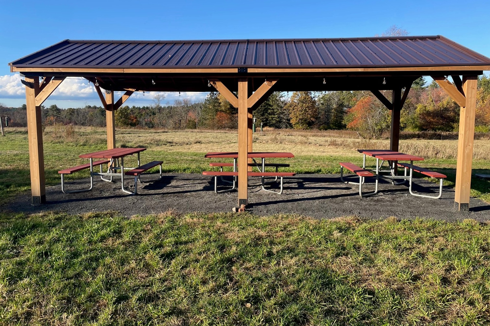 Ipswich River's Innermost Pavilion - a covered space with three picnic tables beneath