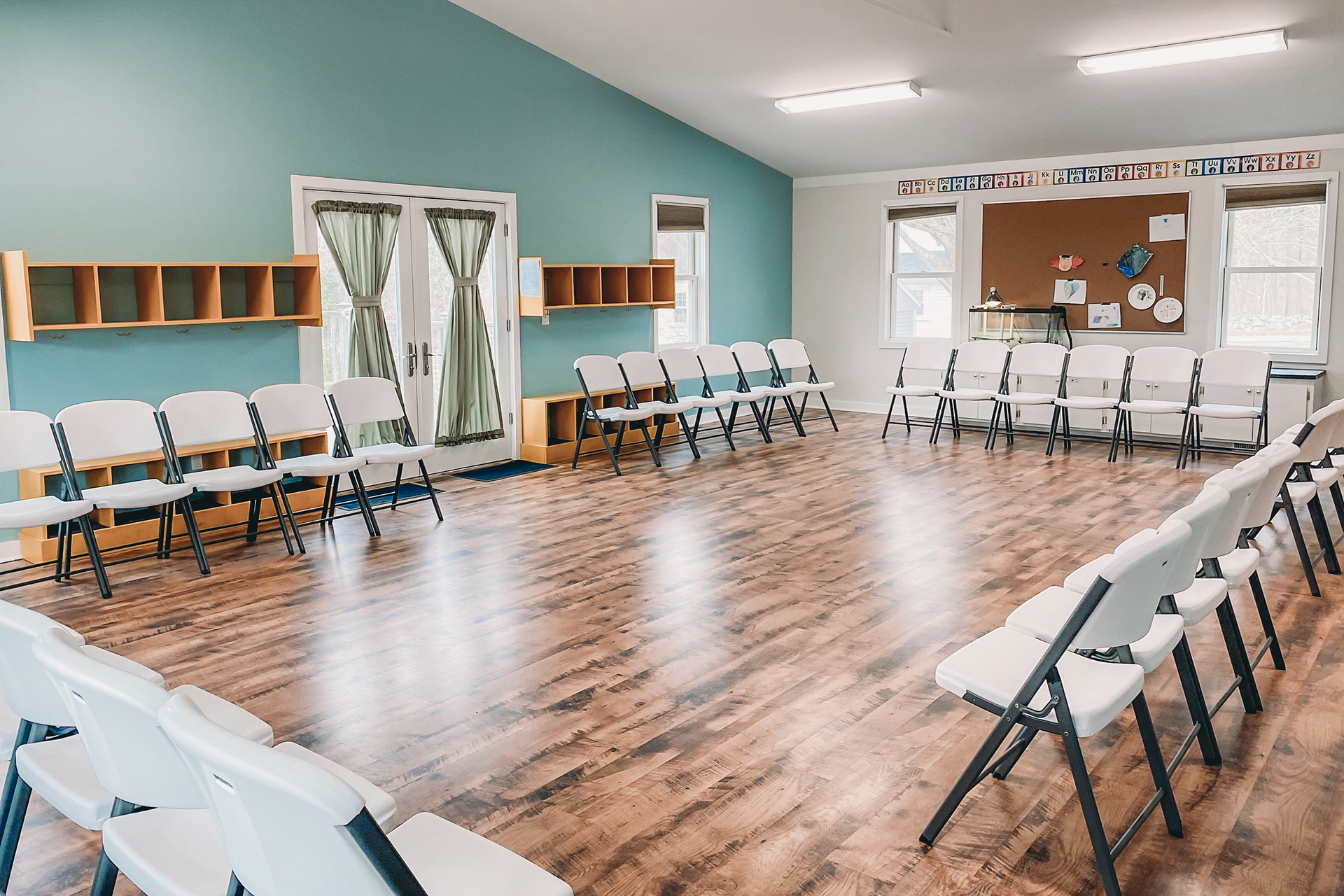 Auditorium set up to accommodate chairs around its perimiter