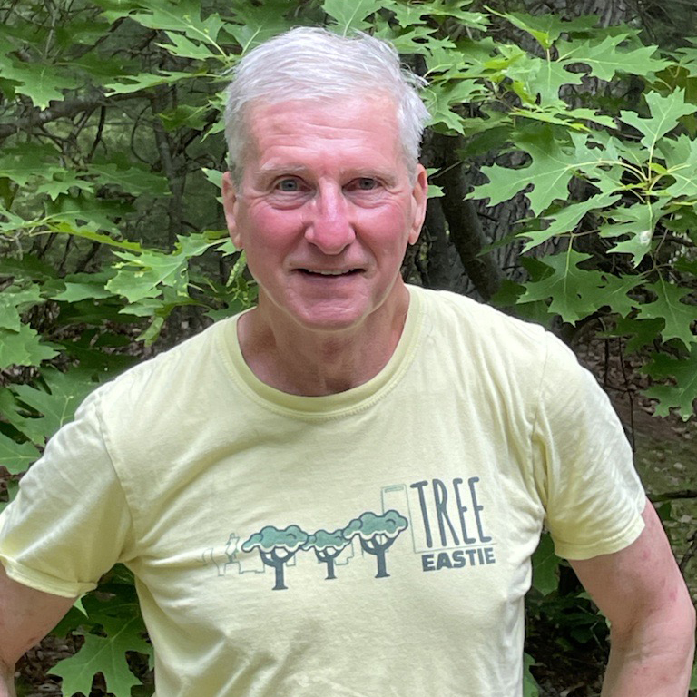 Bill Masterson with a yellow Tree Eastie shirt