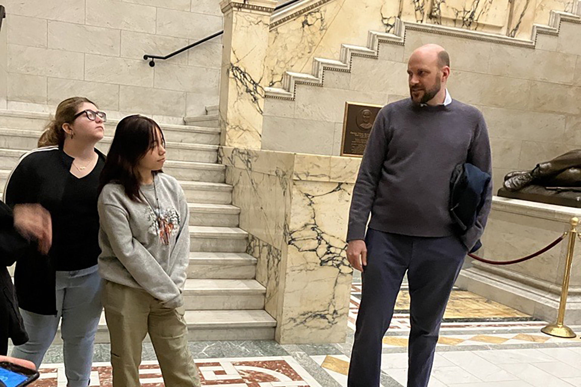 State House tour guide speaking to YCLP students