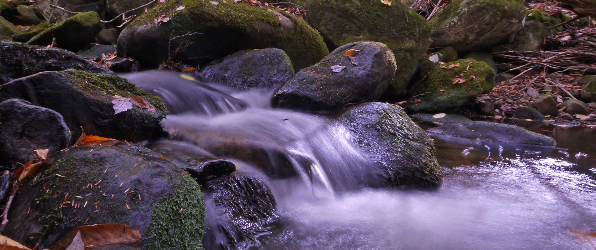 Flowing water down a cascade of rocks.