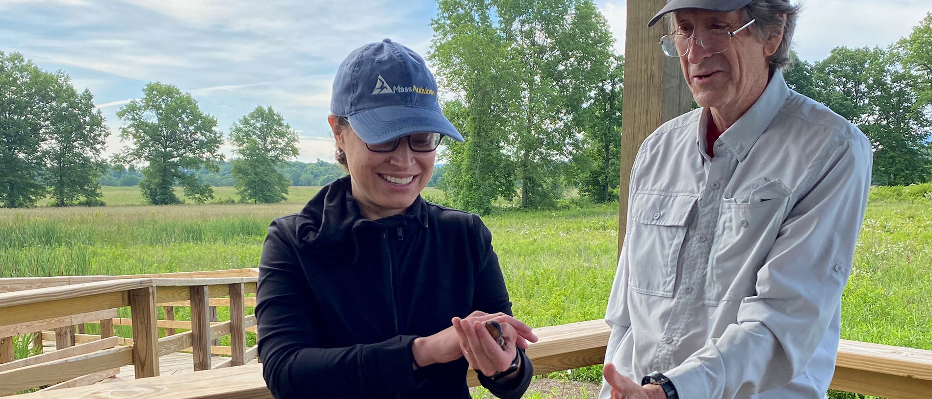 stephanie kane holding a bird next to jon atwood