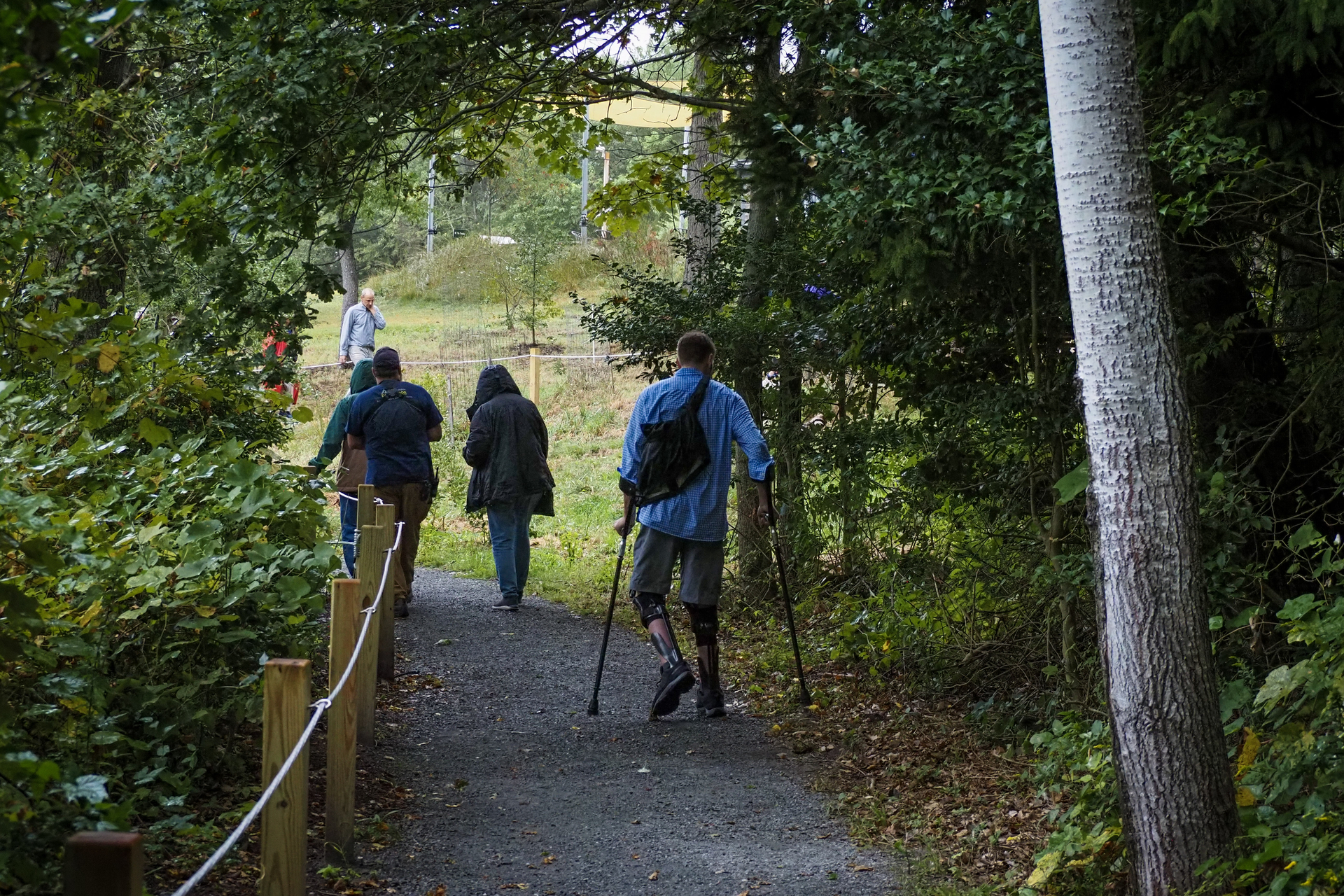 Groups of people walking along an All Persons Trail
