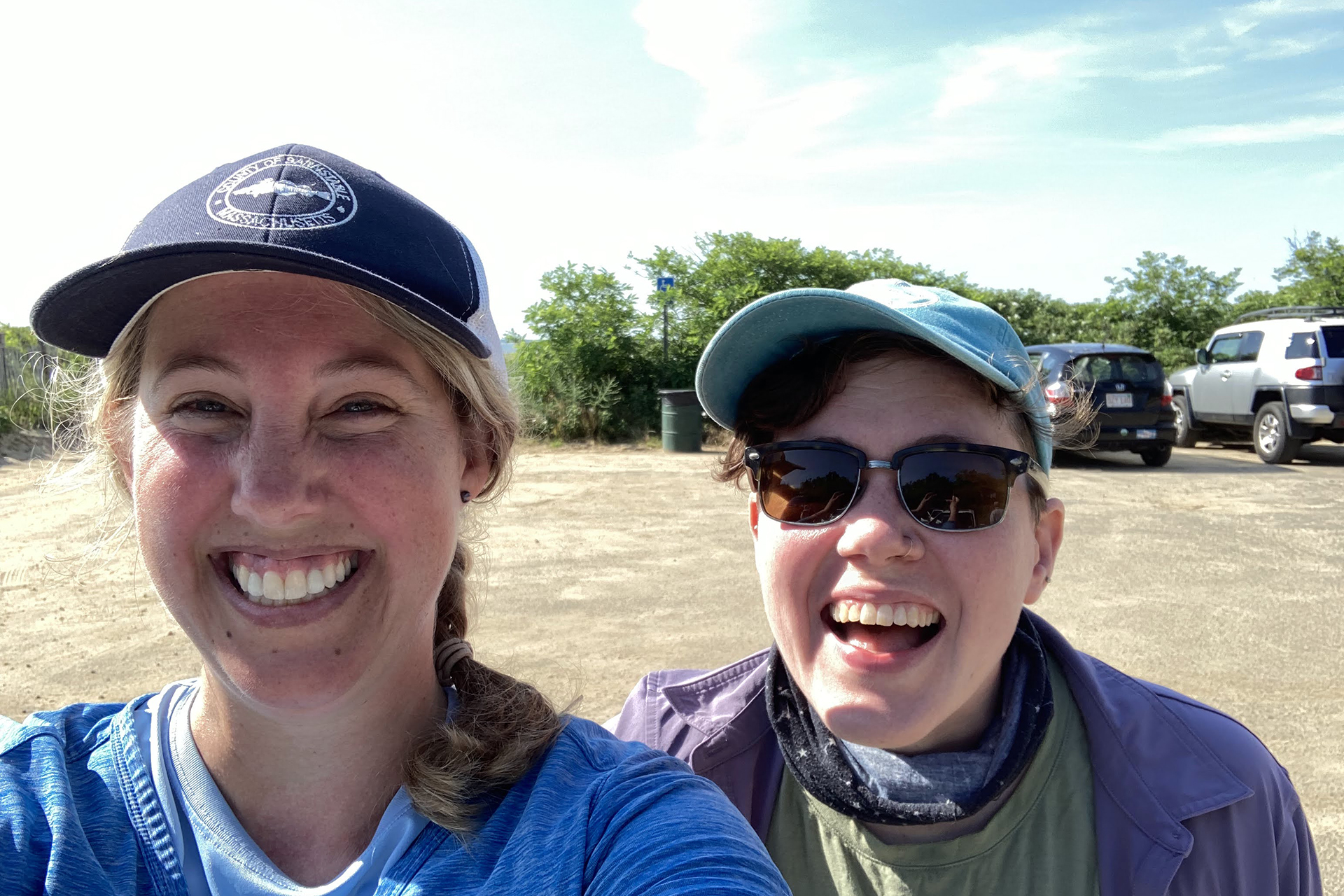 Two Wellfleet Bay staff smiling for a photo