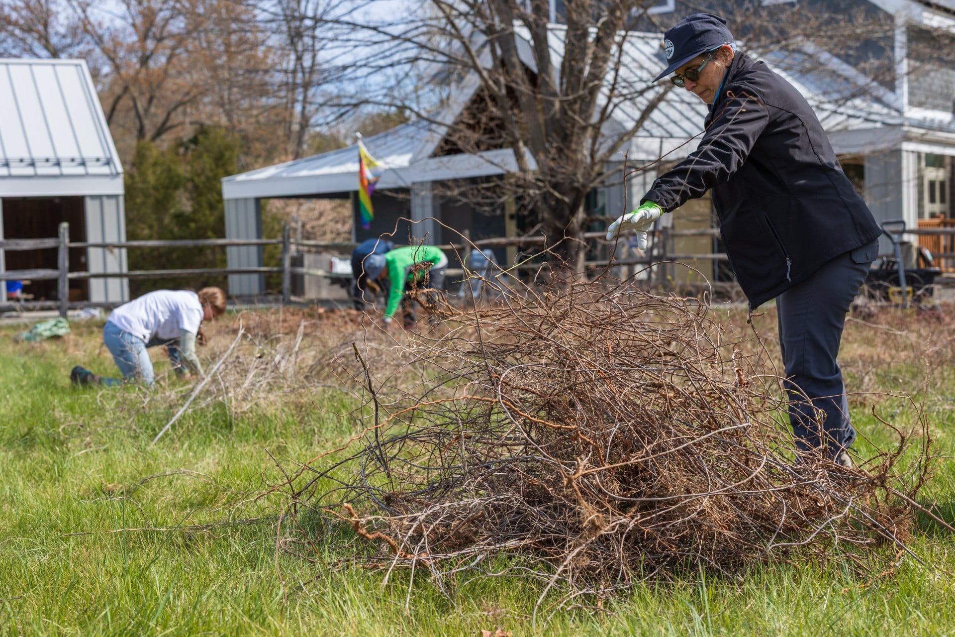 Volunteers weeding at Broadmoor on Statewide Volunteer Day.