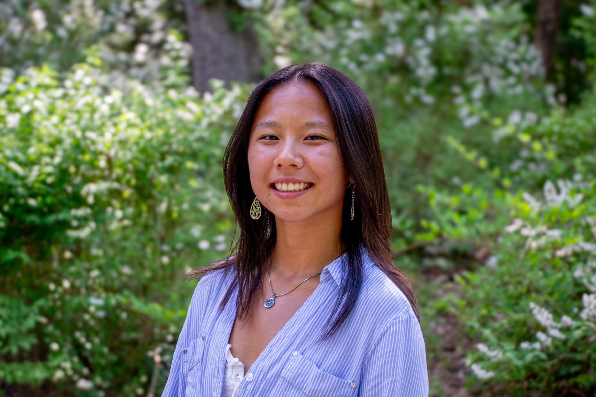 Hedy Yang smiling outside