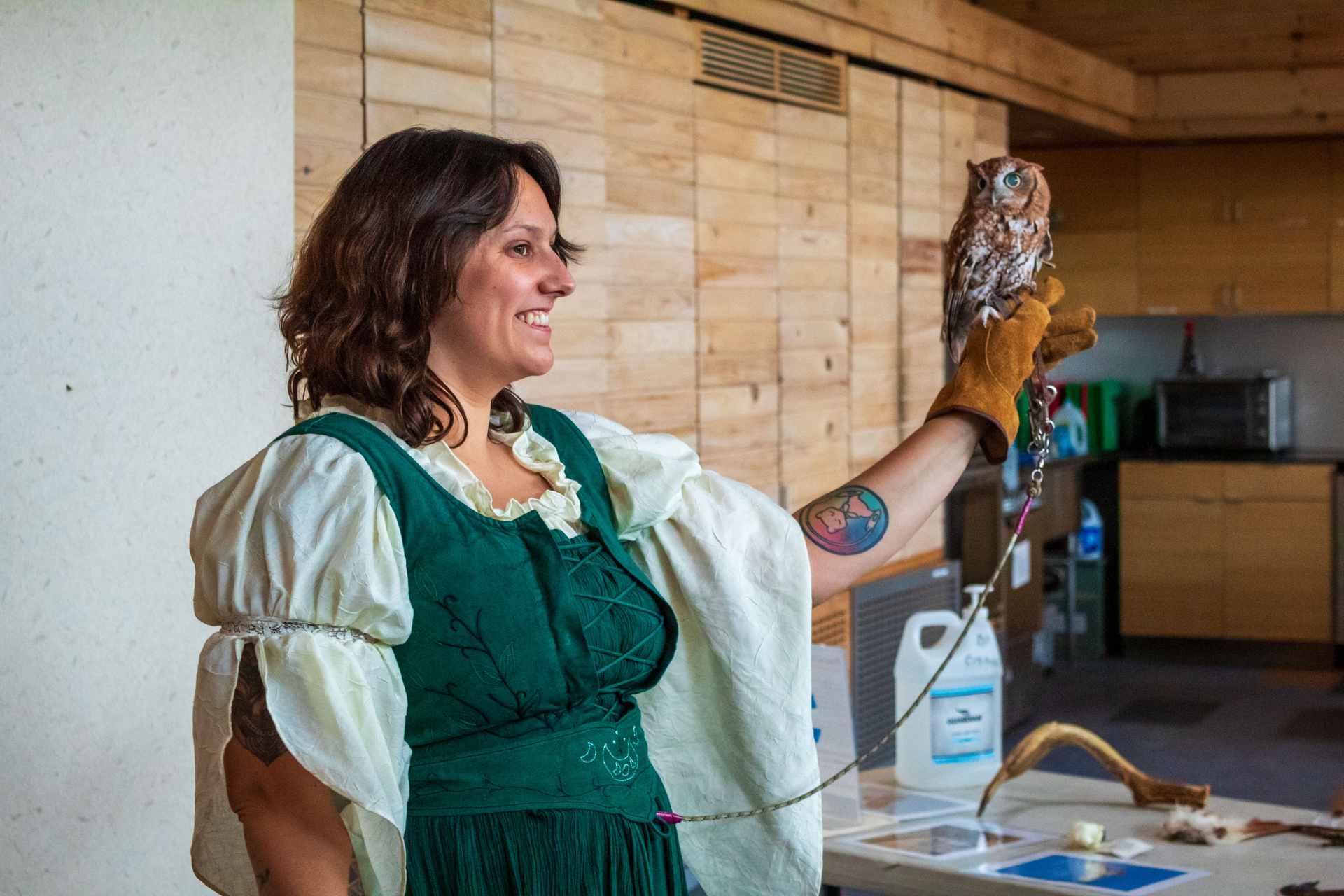 Staff in costume with screech owl
