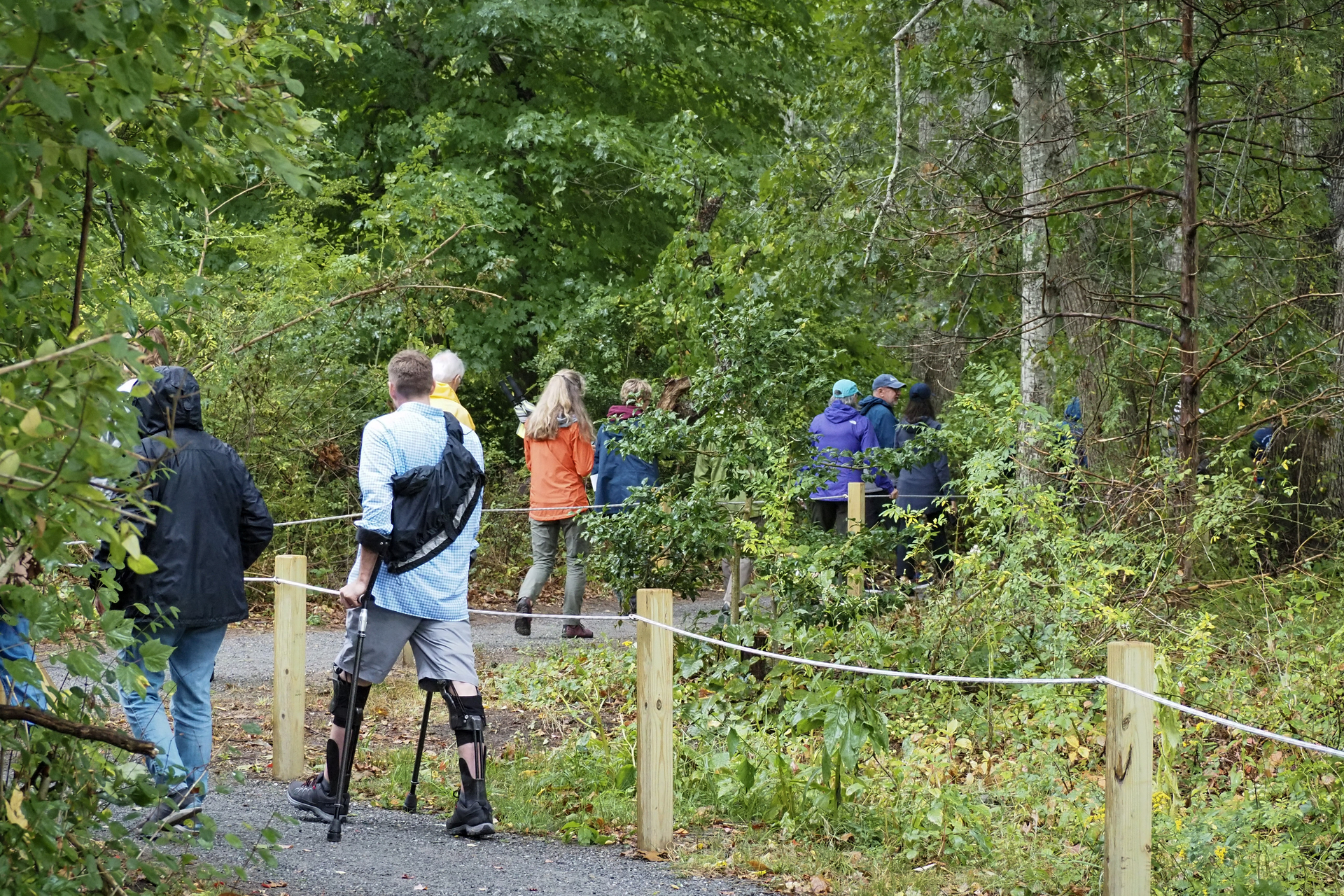 group of people walking along the All Persons Trail