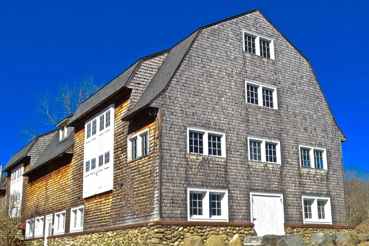 Up close view of the Crocker Barn under a bright blue sly