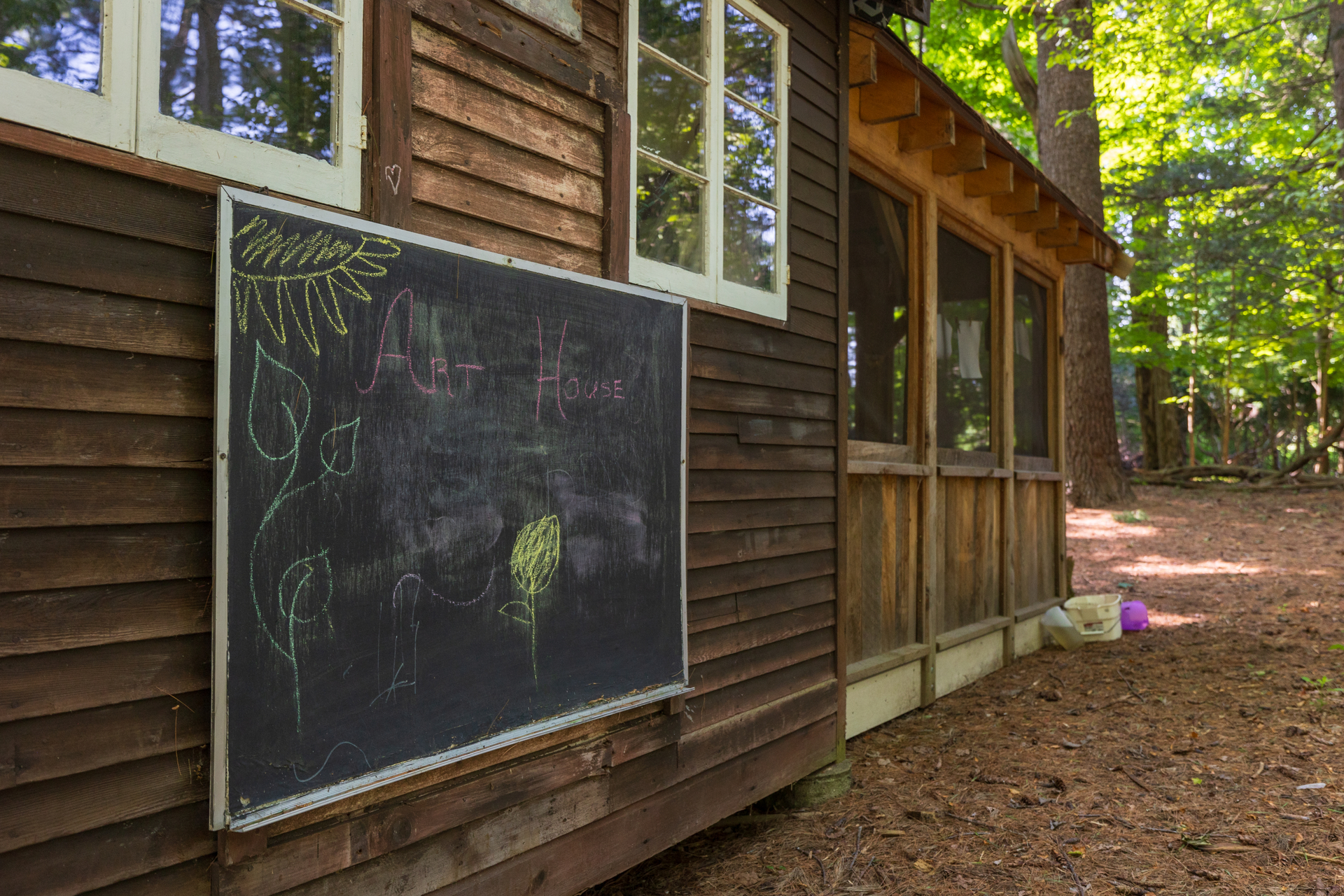 chalkboard that says art house