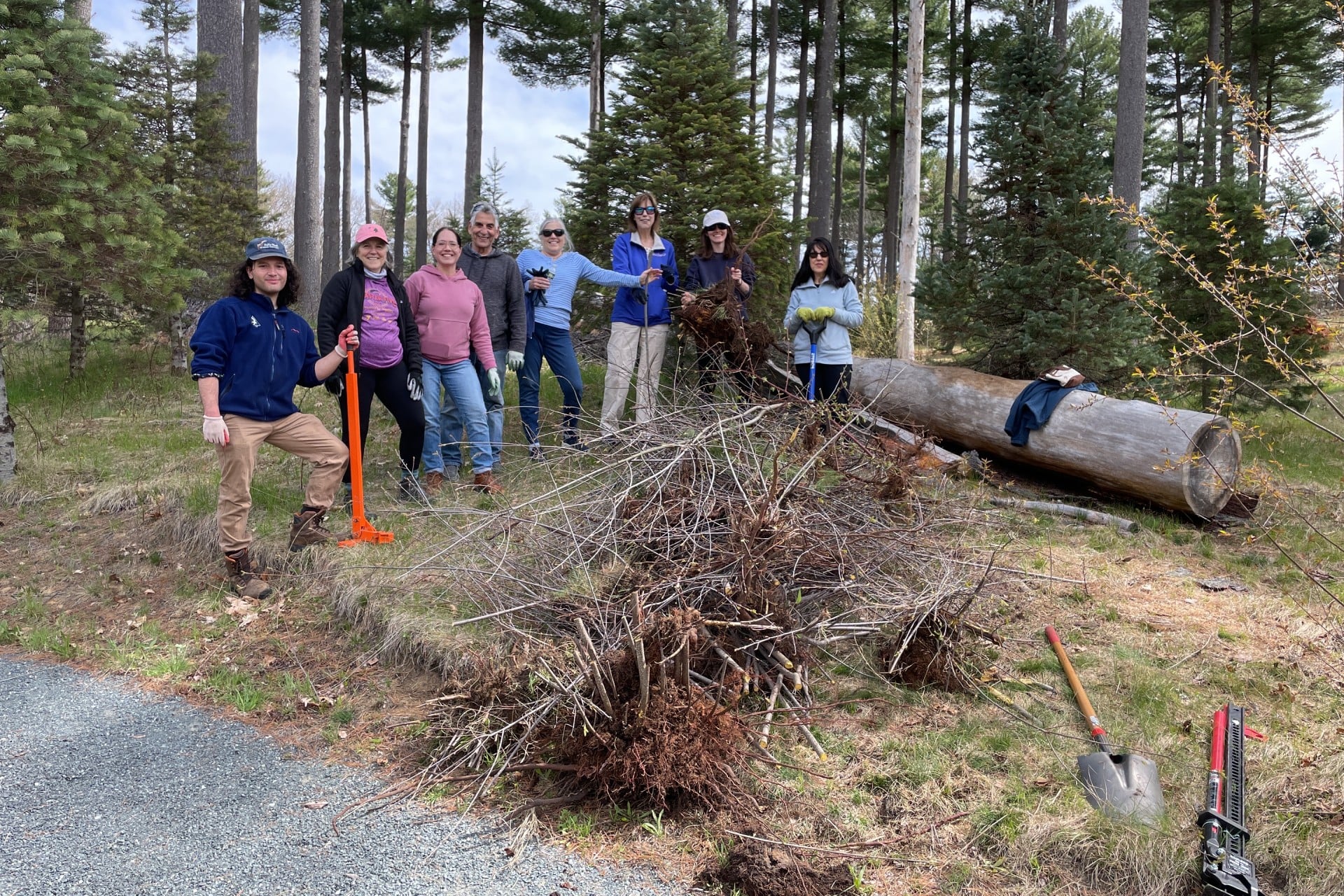 Volunteers pose alongside their work on Statewide Volunteer Day at Pawtucket Farm.