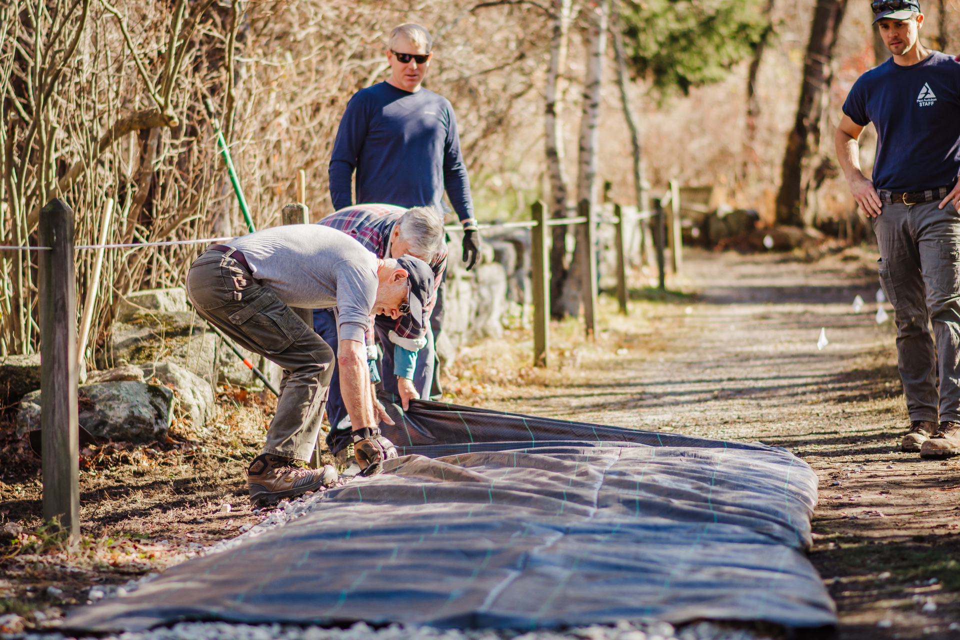 Statewide property team laying out the "gravel burrito"