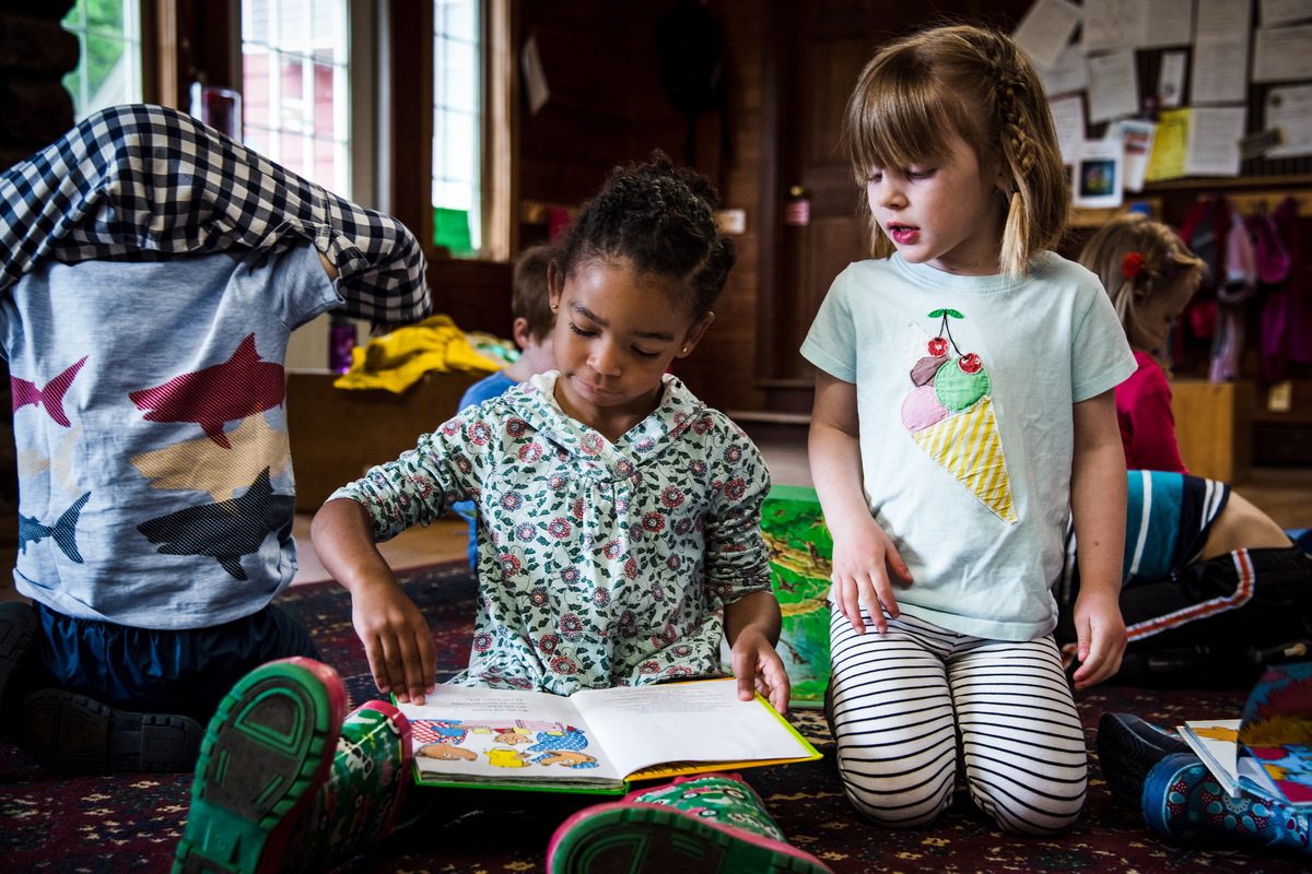 Drumlin Farm preschoolers reading a book