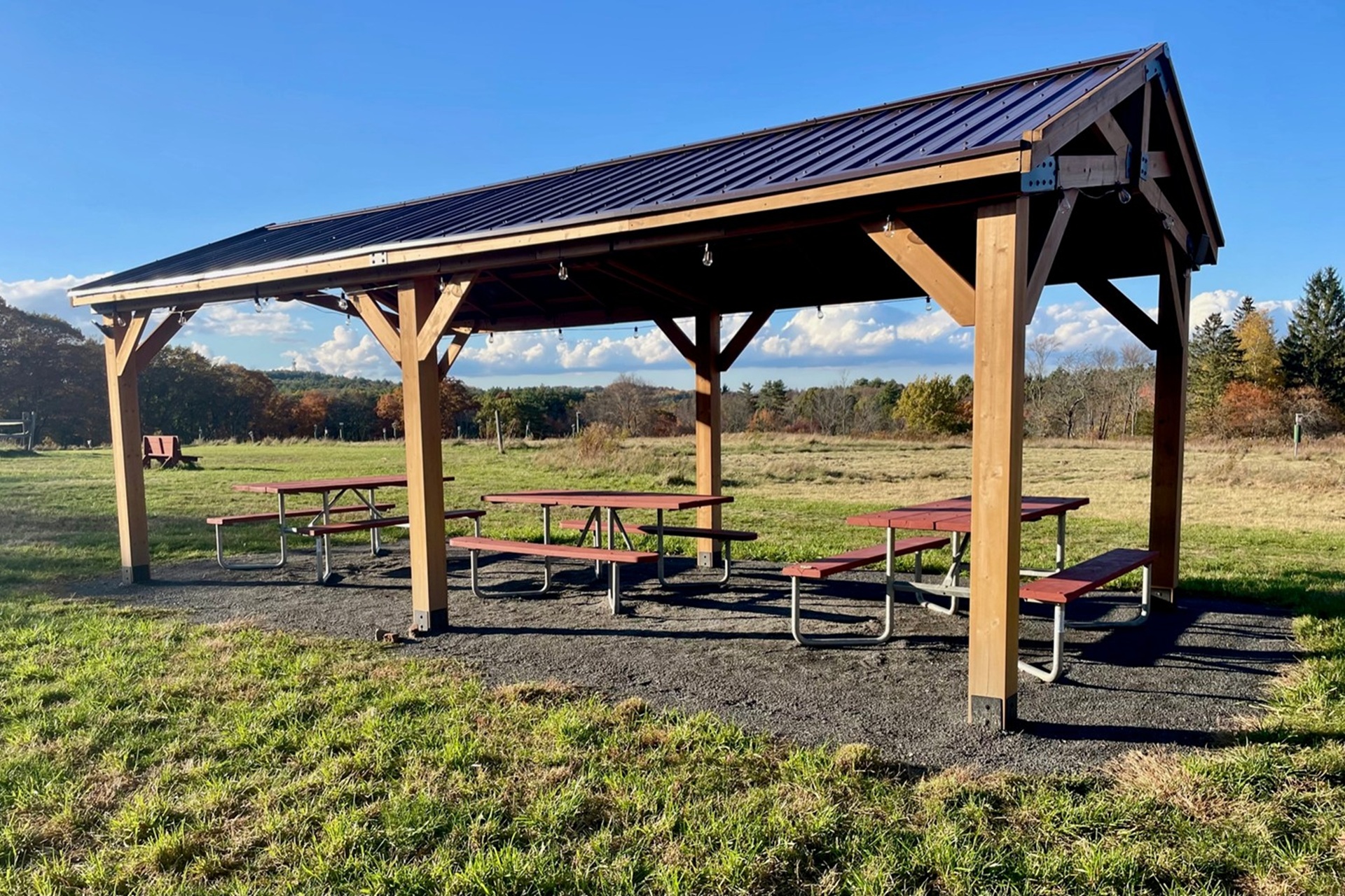 Ipswich River's Innermost Pavilion - a covered space with three picnic tables beneath