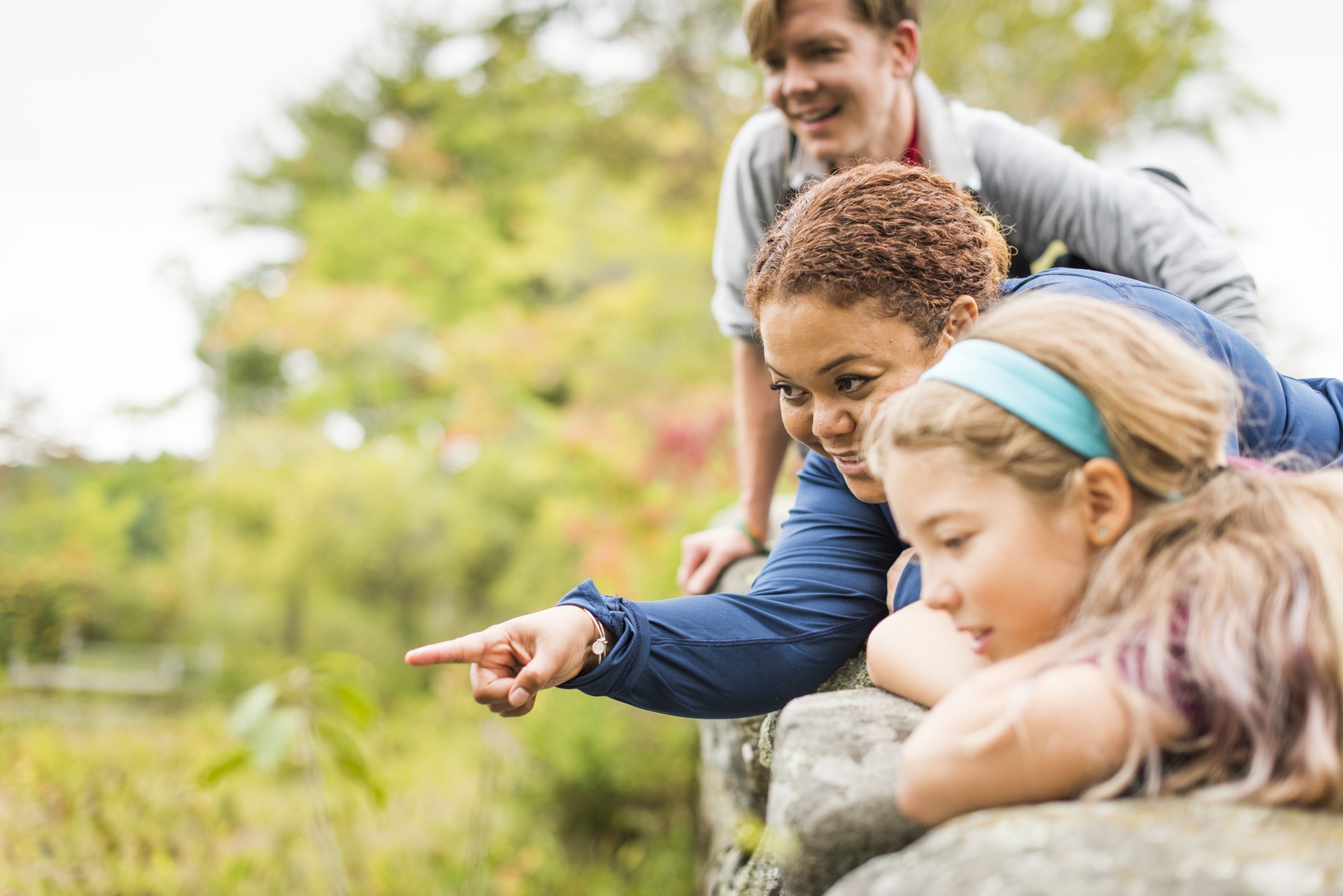 Woman pointing off screen