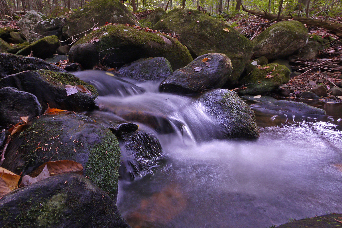 Flowing water down a cascade of rocks.