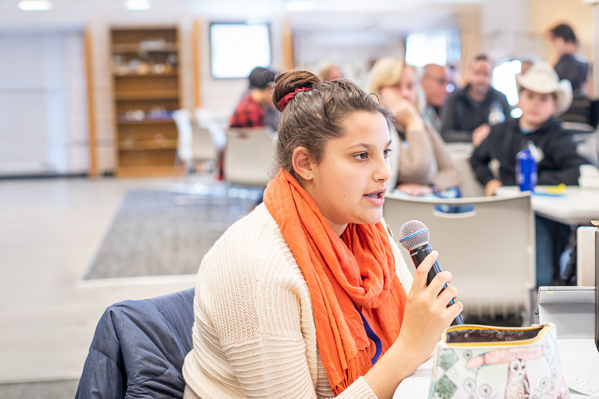 Youth Climate Participant with a Microphone