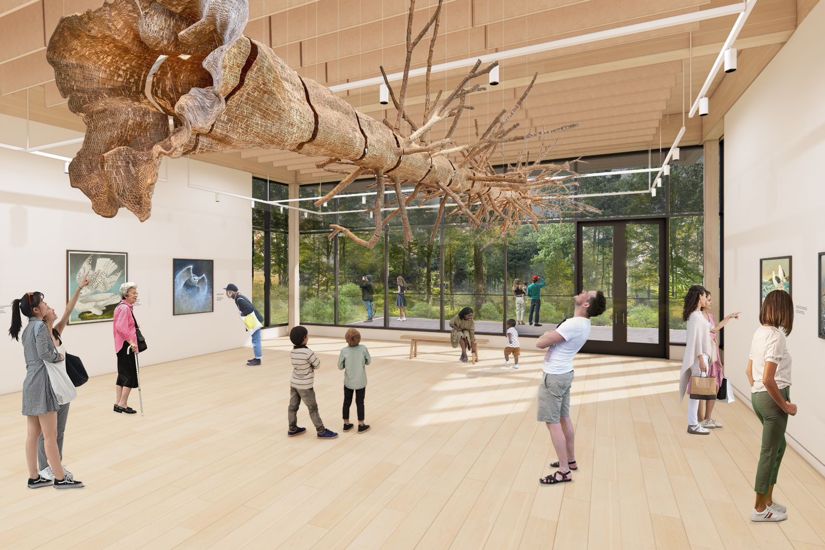 Rendering of what MABA will look like on the inside. Floor to ceiling windows, wood floor and ceiling, white walls with art hanging and tree hanging from ceiling