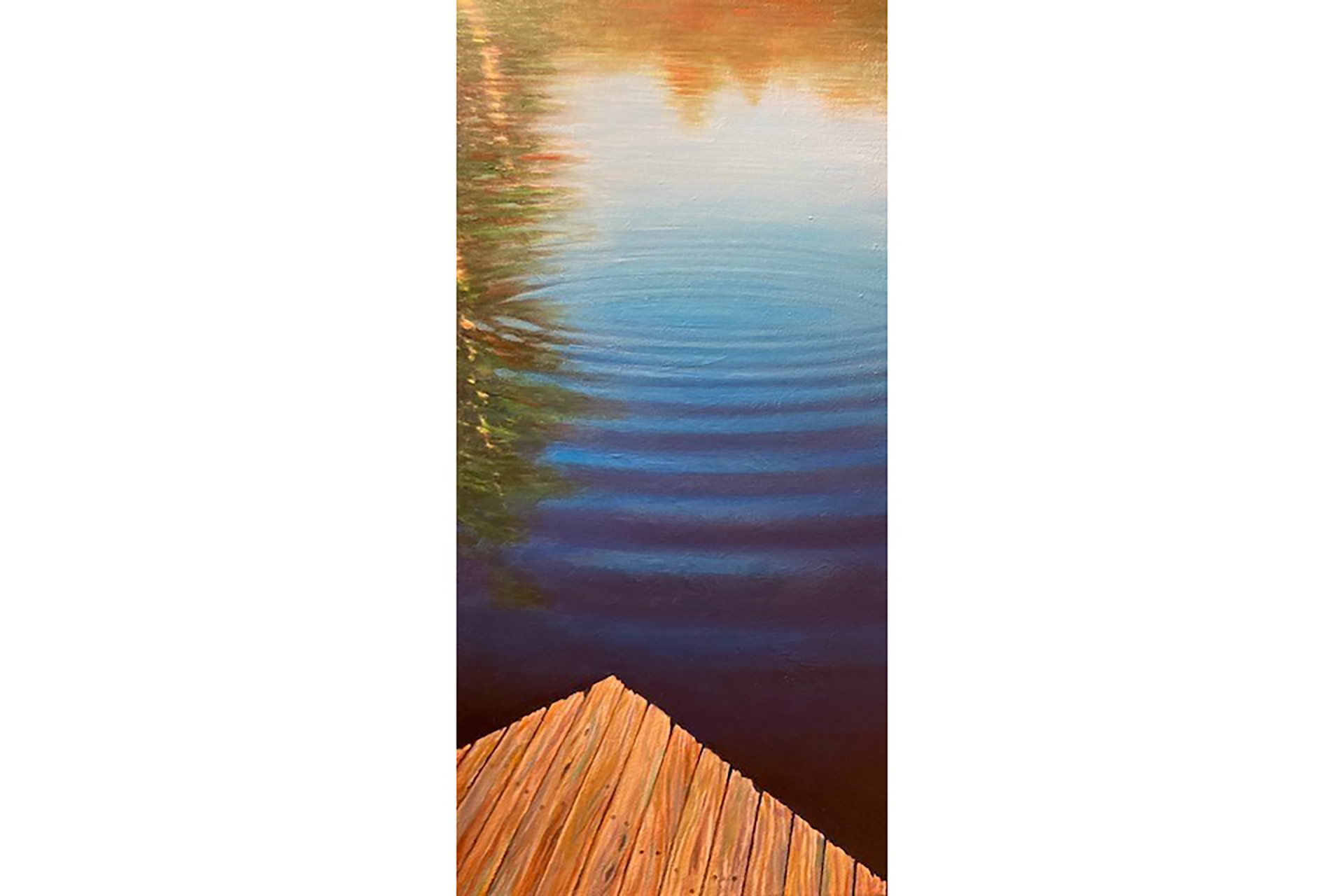 long vertical photo of a pond at the edge of a boardwalk