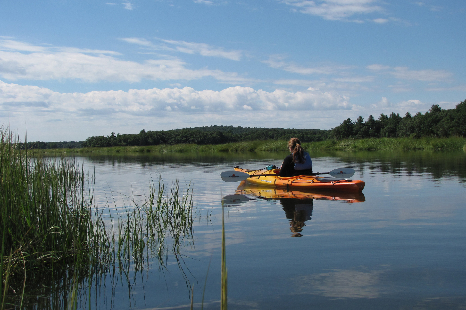 kayaker resting in a river