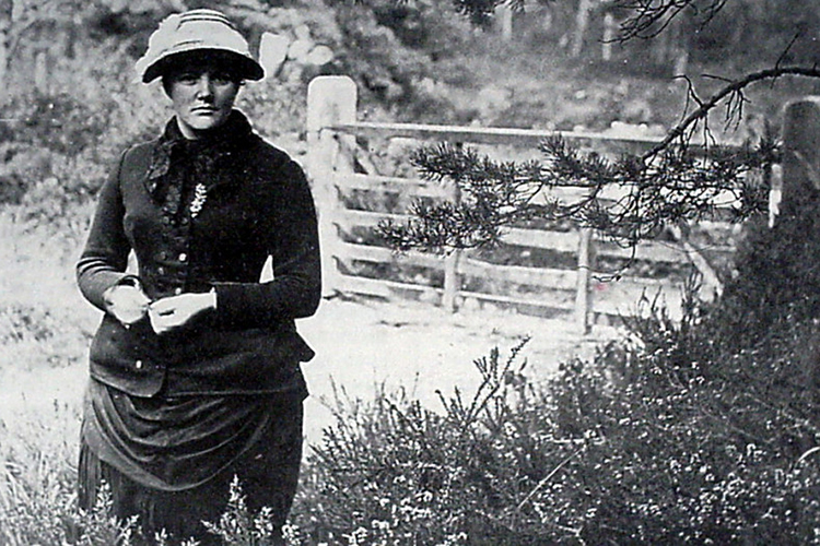 Photo of a young Harriet Hemenway in a field