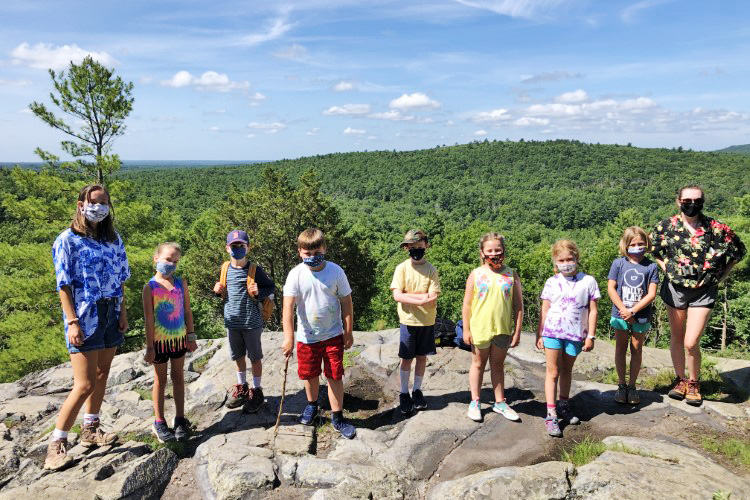 Campers & counselors at Blue Hills overlook as part of Blue Hills Nature Day Camp