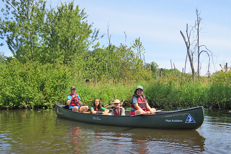 Campers canoeing at Ipswich River Wildlife Sanctuary Day Camp