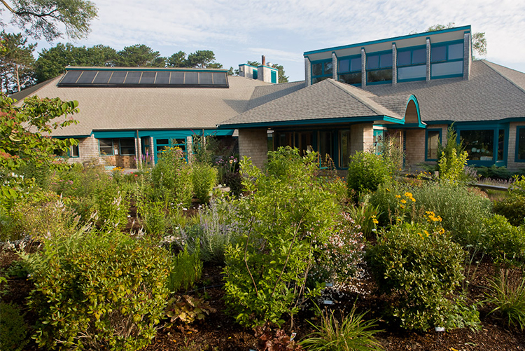 Exterior of WB Nature Center showing garden & solar panels