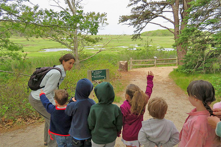 Wellfleet Bay educator Spring Beckhorn leads preschoolers on a field trip